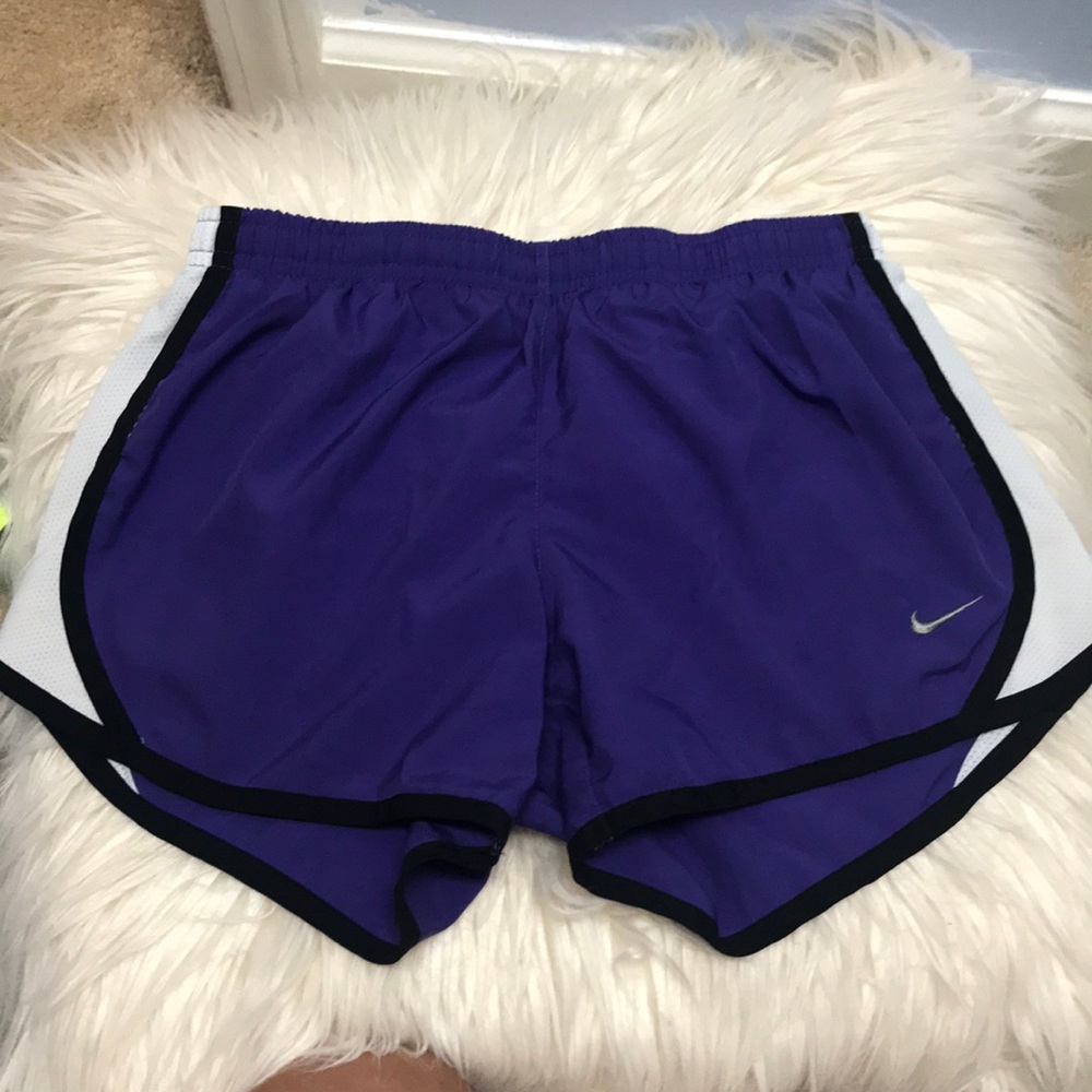 purple Nike shorts